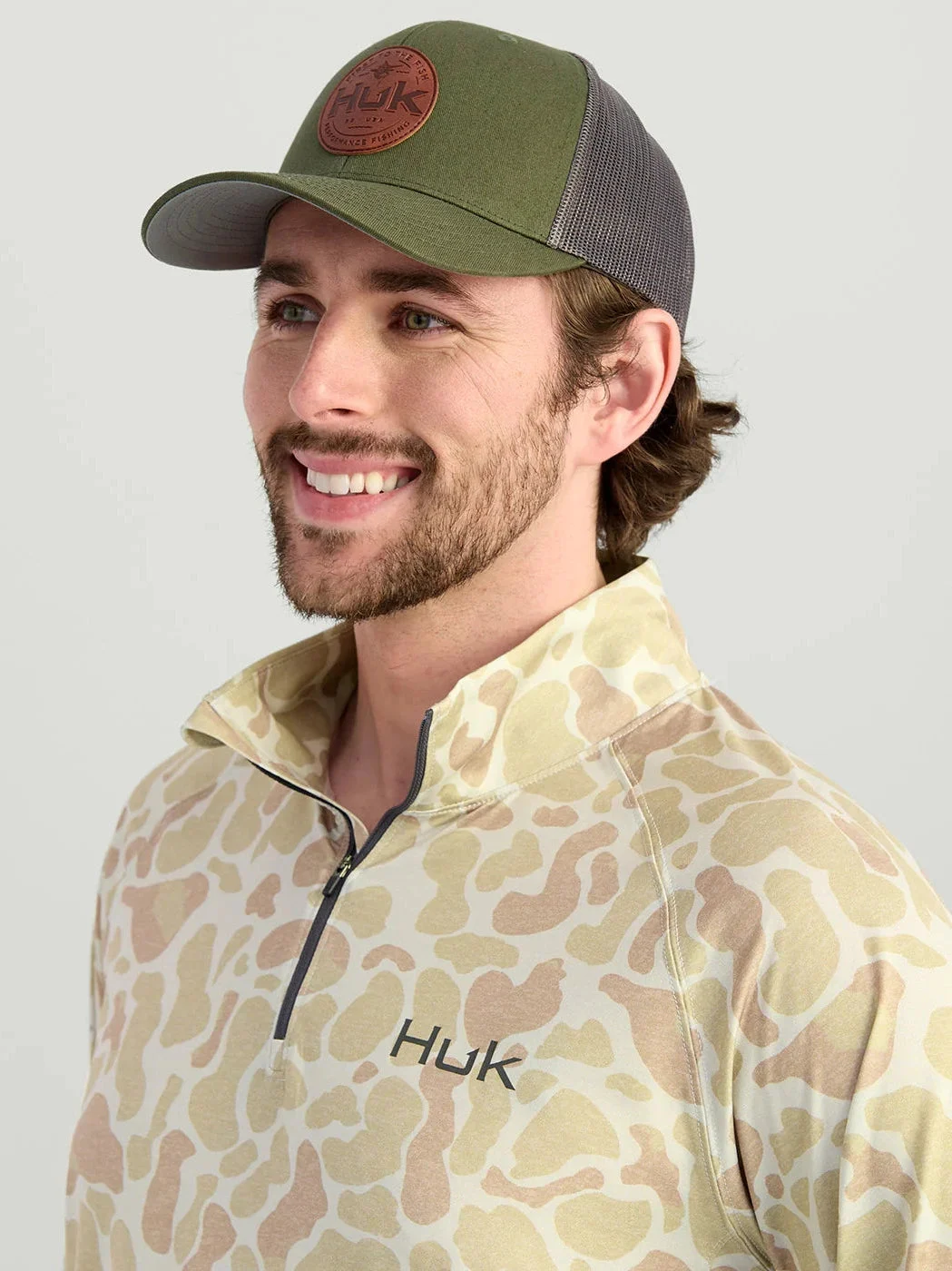 Huk Leather Patch Trucker Hat