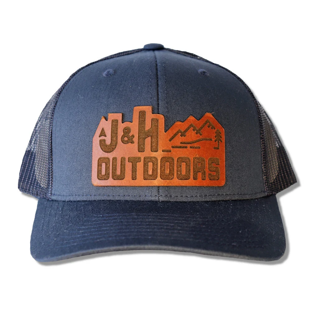 J&H LEATHER PATCH TRUCKER HAT